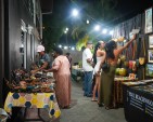 Patrons browse handcrafted jewellery, leather goods and artwork at a previous staging of Kingston Night Market.